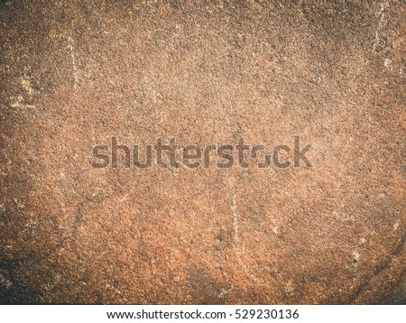 Cave wall rustic rough stone Brown grungy rock surface for texture and background design backdrop. Royalty-Free Stock Photo #529230136