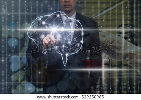 Businessman hand pointing the brain over the Chemical Laboratory and medicine background, technology and healthy concept