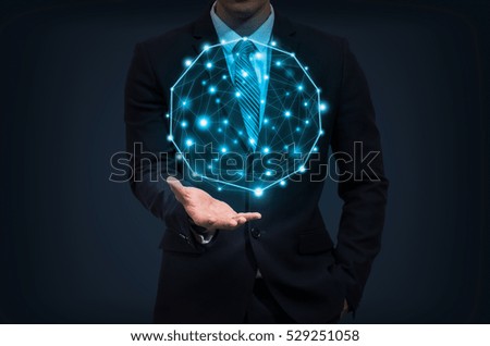 Businessman hand holding the Futuristic Technology connection shape over dark background, business technology and Social Network concept