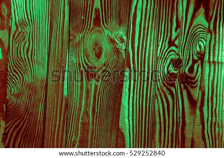 Perfect light dark green reddish greenish irregular old dark bright wood timber surface texture background. Fine artistic backgrounds of almost gray resulting from various rough construction materials