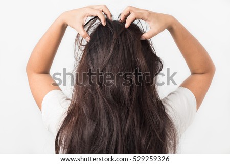 Women itching scalp ,itchy his hair
