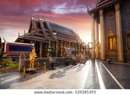Temple of the Emerald Buddha Wat Phra Kaew in Bangkok at sunset