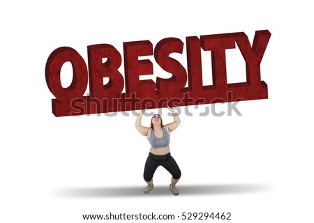 Picture of fat woman lifting a big obesity word while standing in studio, isolated on white background 