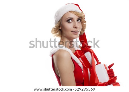 Picture of cheerful santa helper blond young girl with gift box