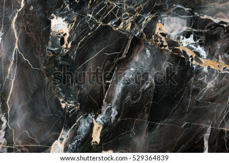 Mulicolored dark natural marble. High resolution photo.