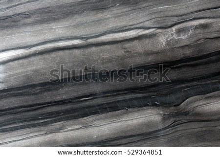 Natural dark gray marble stone texture. High resolution photo.