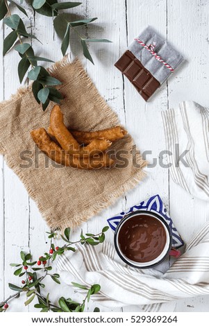 Hot Chocolate with churros with dark background