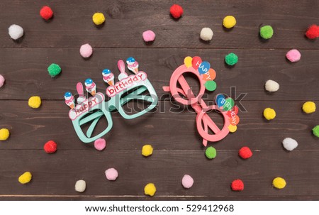 Polka dot background and glasses on the wood with copy space.