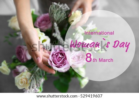 Female florist making bouquet. Text INTERNATIONAL WOMAN'S DAY, 8TH MARCH on background