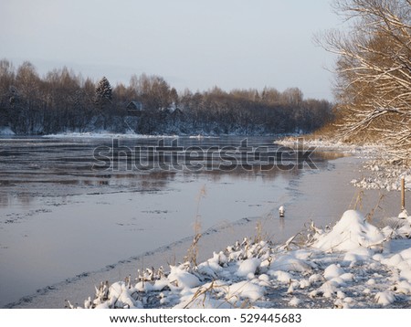  Winter landscape with the river in frosty day