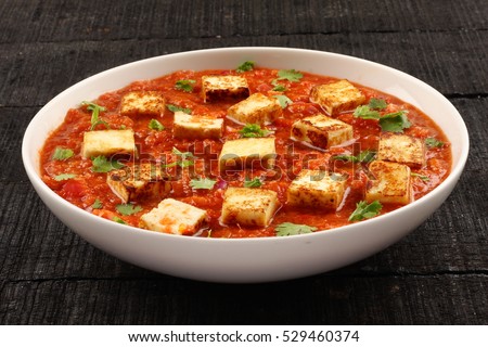 Famous indian food recipe-paneer butter masala Royalty-Free Stock Photo #529460374