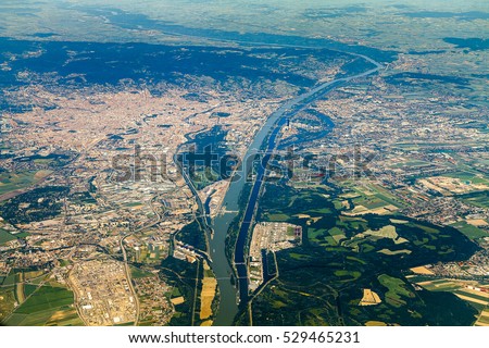 Aerial view of Vienna,capital of Austria, Europe. Points of interest such as Donau river, Donau canal, Donauinsel, DC Tower, baroque medieval city, Schonbrunn palace, St Stephen's cathedral.