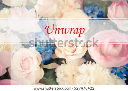 Unwrap  - Abstract information to represent Merry Christmas and Happy new year as concept. The word Unwrap  is a part of Merry Christmas and Happy new year celebration vocabulary in stock photo.