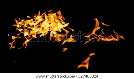 red yellow flames on black background