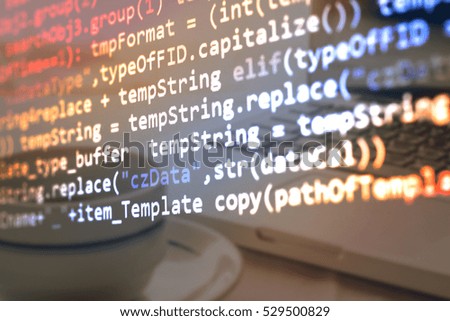 Developer working on software codes in office. Writing program code on computer. Web site codes on computer monitor. Programming code background. Code text written and created entirely by myself.