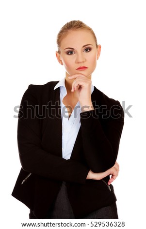 Young serious thoughtful business woman