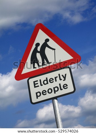 ELDERLY PEOPLE ROAD TRAFFIC SIGN AGAINST BLUE SKY