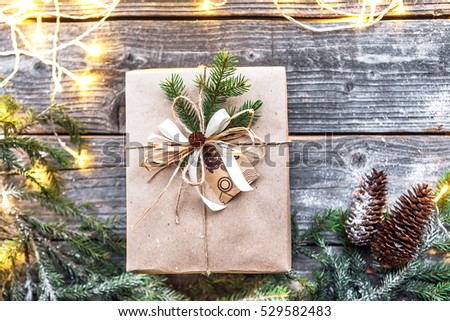 Stylish branding mockup to display your artworks. Cute vintage christmas new year gifts mock up on wooden background