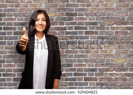 latin business woman doing okay gesture
