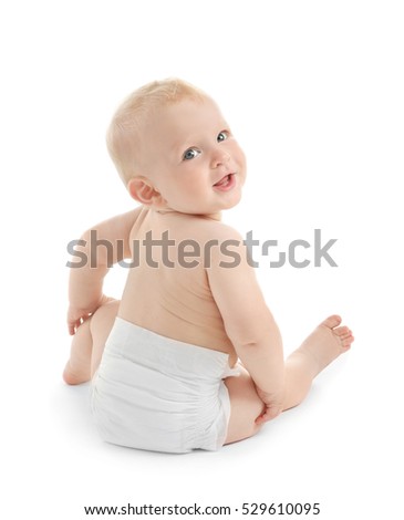 Baby sitting on white background Royalty-Free Stock Photo #529610095