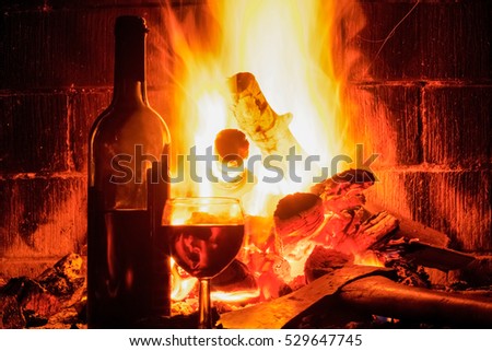 Fireplace with bottle of red wine