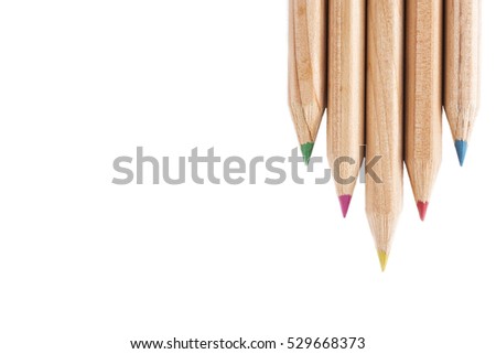Colored pencils composition isolated on white background