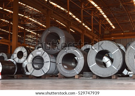 Raw material Handling: Steel coil storing inside warehouse Royalty-Free Stock Photo #529747939