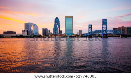 Jacksonville, Florida city skyline over the St. John's River (building logos blurred for commercial use)