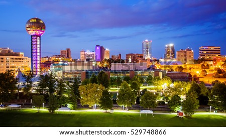 Downtown Knoxville, Tennessee city skyline and city lights at night Royalty-Free Stock Photo #529748866