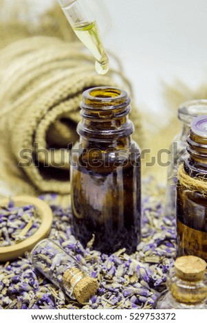 Lavender essential oil in a small bottle.