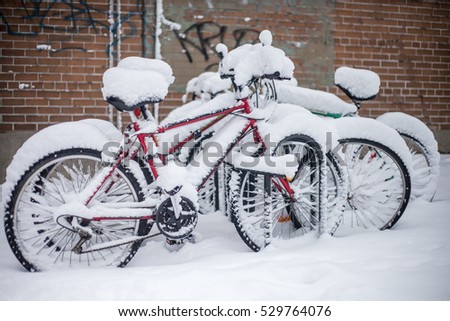 Bicycle under the snow 