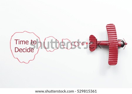 writing time to decide red toy airplane with talk bubble on white background