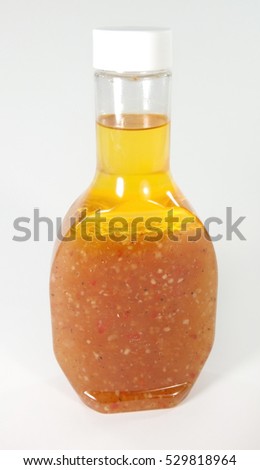 Plastic bottle of salad dressing. No label. Vertical. Royalty-Free Stock Photo #529818964
