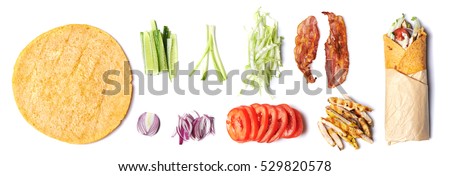 ingredients for wrapped sandwich isolated on white background. top view Royalty-Free Stock Photo #529820578