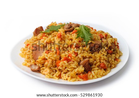 rice pilaf with meat carrot and onion isolated on white background Royalty-Free Stock Photo #529861930