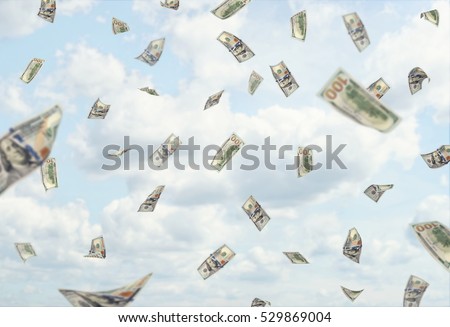 Lots of hundred dollars banknotes falling from the blue cloudy sky. Sudden changes in income. Make profits. Business development. Rise in profitability.