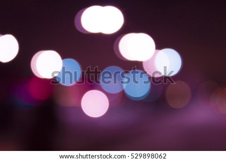 Abstract background with bokeh and defocused  lights in the city streets.