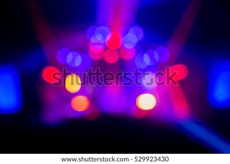 High resolution Abstract glowing circle motion blurred background in dark vivid red, green, yellow, blue