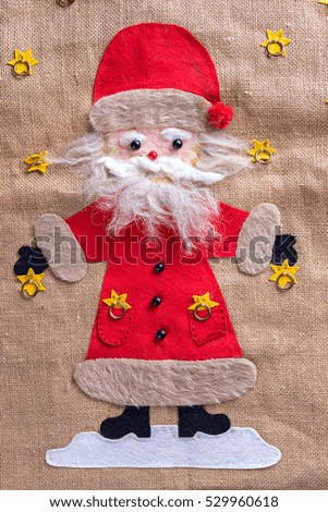 funny Santa Claus image on sackcloth. New Year card