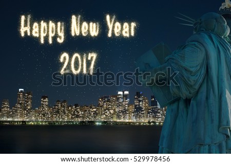 2017 HAPPY NEW YEAR FIREWORKS GREETING / BACK SIDE OF STATUE OF LIBERTY WITH BACKGROUND OF NIGHT VIEW OF NEW YORK / MANHATTAN OVER HUDSON RIVER