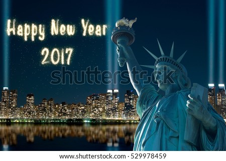 2017 HAPPY NEW YEAR FIREWORKS GREETING WITH STATUE OF LIBERTY AND BACKGROUND OF NIGHT VIEW OF NEW YORK / MANHATTAN OVER HUDSON RIVER