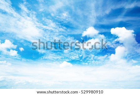 blue sky with clouds closeup Royalty-Free Stock Photo #529980910