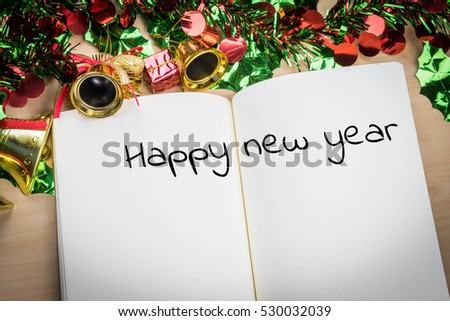happy new year word on notebook with new year decoration for new year holiday.