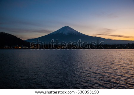 Mountain Fuji with reflection on the lake at sunset time