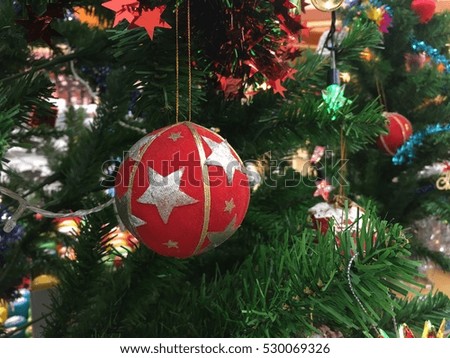 Christmas ball decoration on tree. Concept for greeting card and celebration in new year season