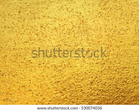 Gold or foil wall paint for the background and texture.