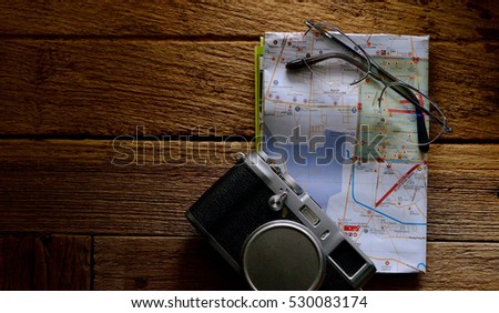 maps and passport in travel holiday concept 