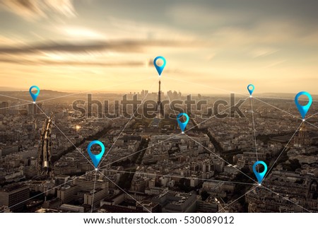 Location pin above cityscape and network connection concept at Paris, France. Royalty-Free Stock Photo #530089012