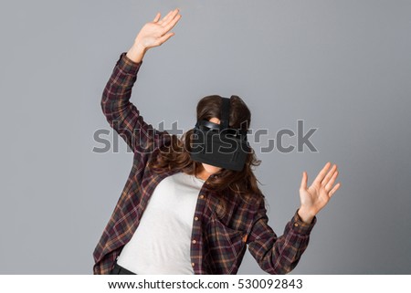 young beauty woman in virtual reality helmet