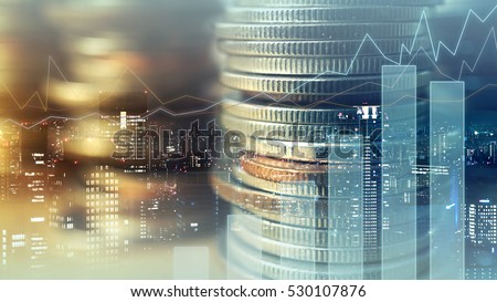 Double exposure of graph and rows of coins for finance and business concept Royalty-Free Stock Photo #530107876